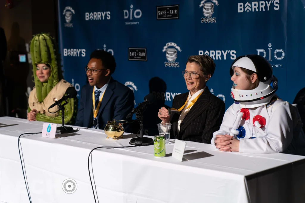 Annette Bening answering questions during a Hasty Pudding Press Conference for Women of the Year