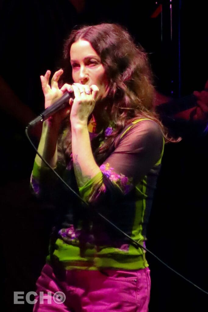 Photo of Alanis Morisette performing in Boston