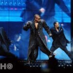 Photo of Usher performing in Boston