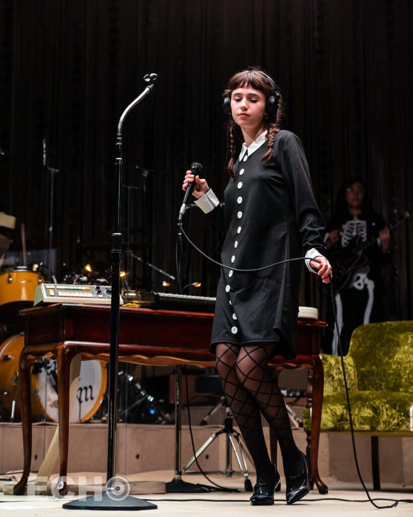 Photo of Clairo performing in Boston