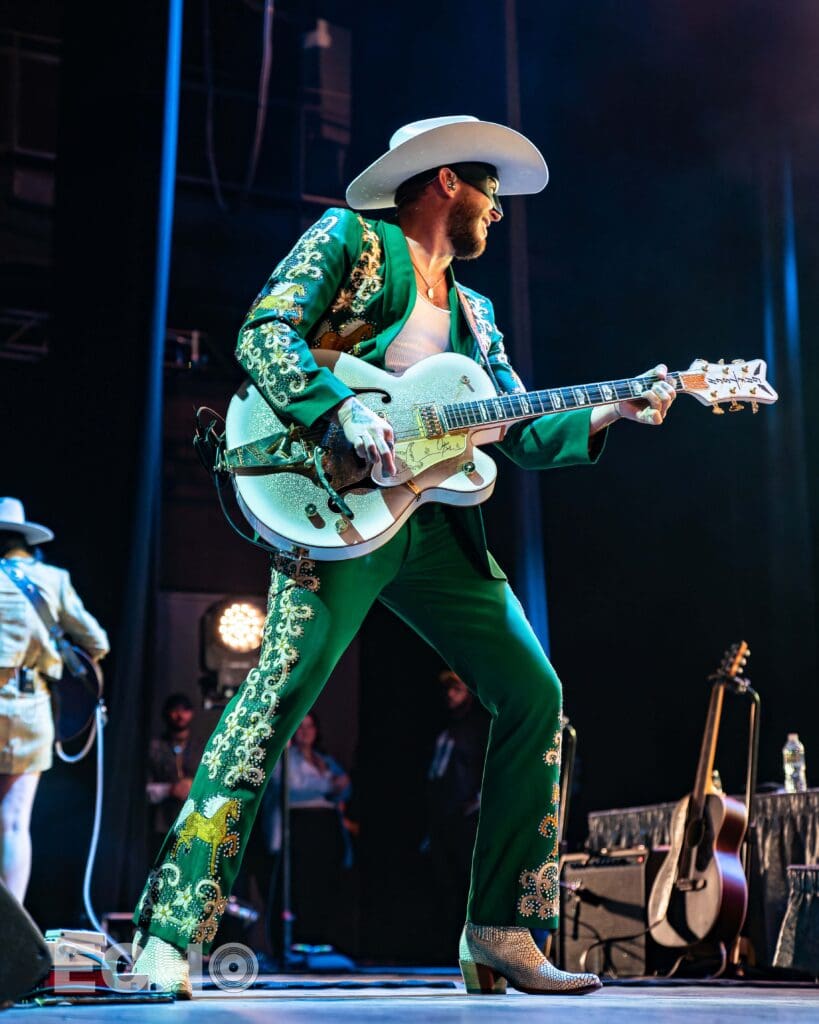 Photo of Orville Peck performing in Boston